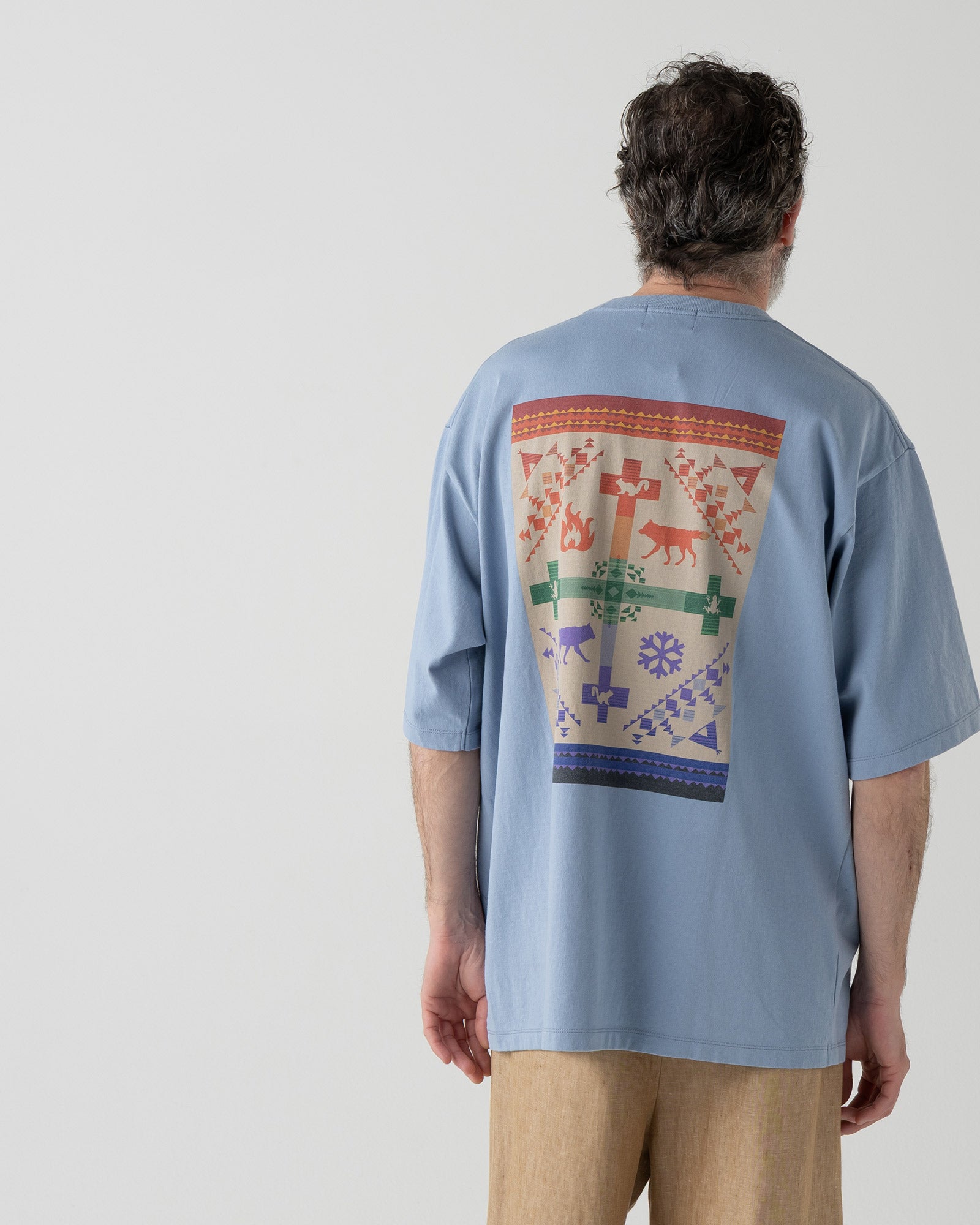 バックプリント コットンTシャツ - SAX【COYOTE STEALS THE FIRE